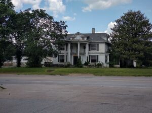 front view of George Moore House in Webb City June 2023