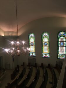 chandelier and art glass windows